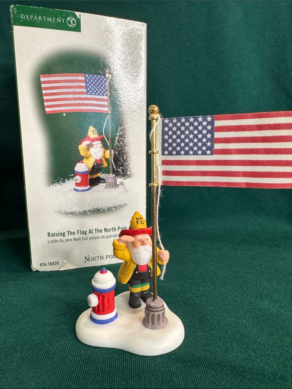 Department 56 Santa Firefighter Raising American Flag - Red, Blue, Green, Yellow